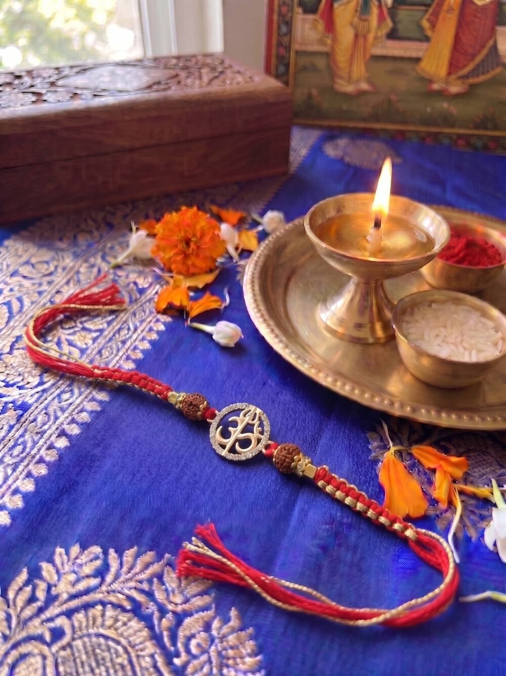 Designer Om Rakhi for Brother with Rudraksha Beads and Red Thread